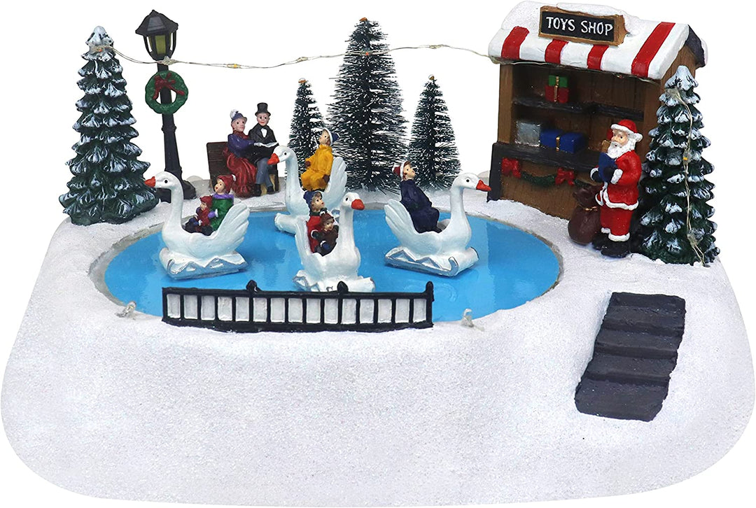 Shop with Moving Swans - Christmas Village Company