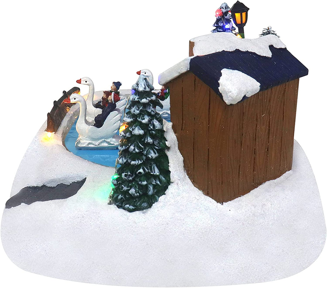Shop with Moving Swans - Christmas Village Company