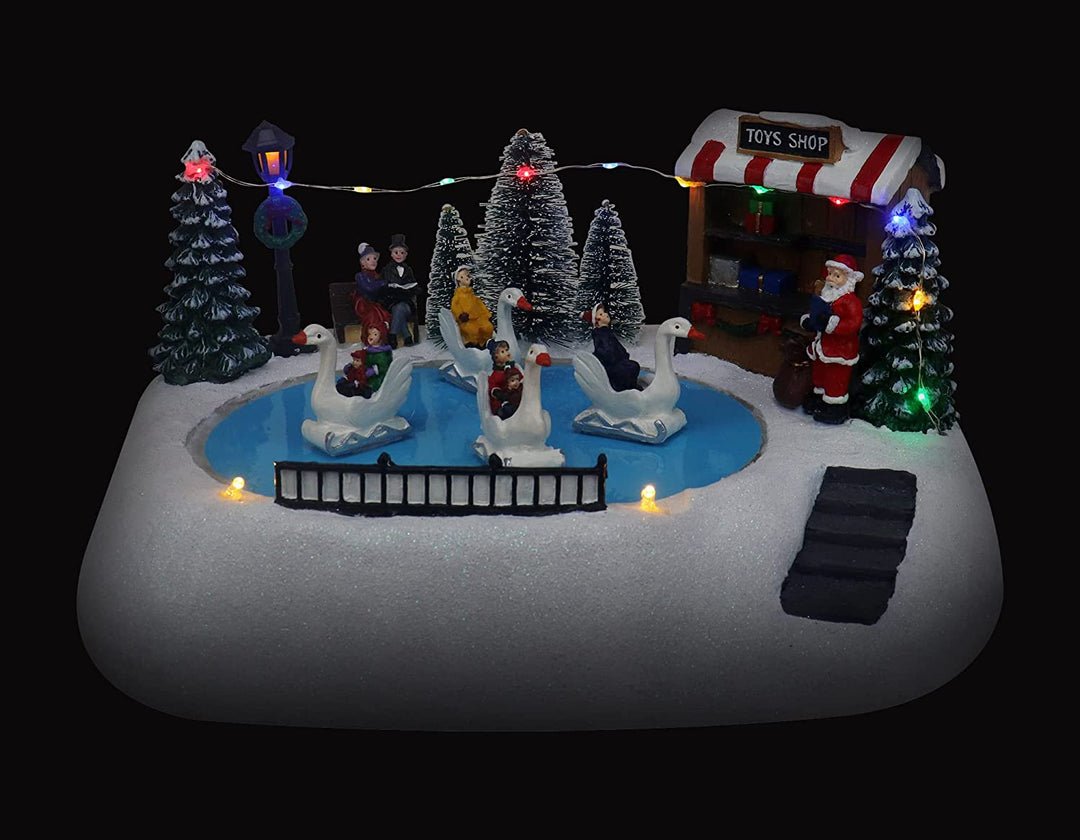Shop with Moving Swans - Christmas Village Company