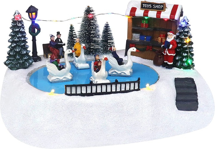 Shop with Moving Swans - Christmas Village Company