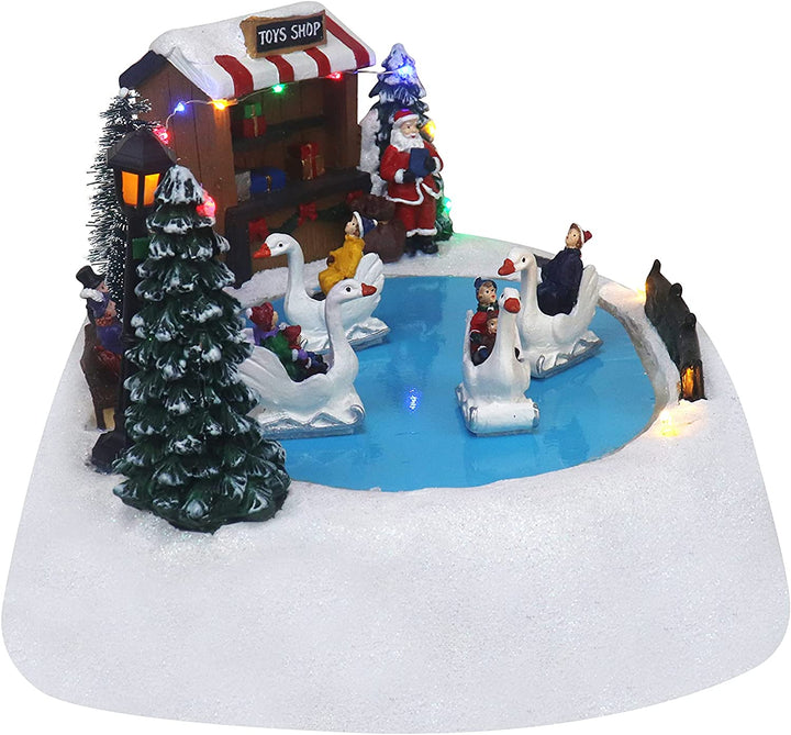 Shop with Moving Swans - Christmas Village Company