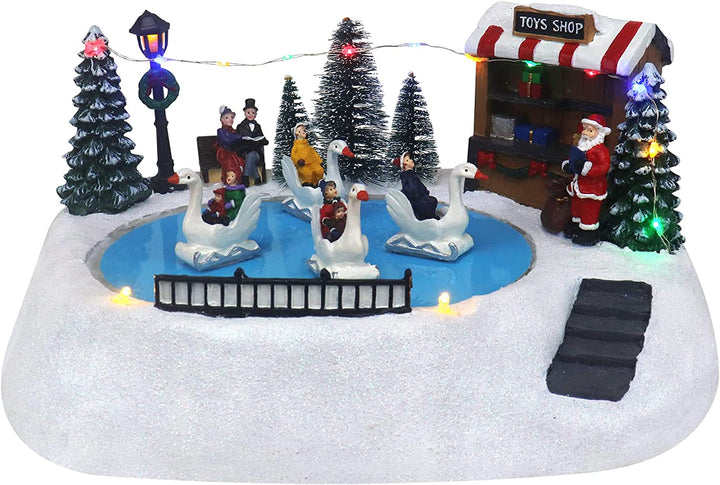 Shop with Moving Swans - Christmas Village Company